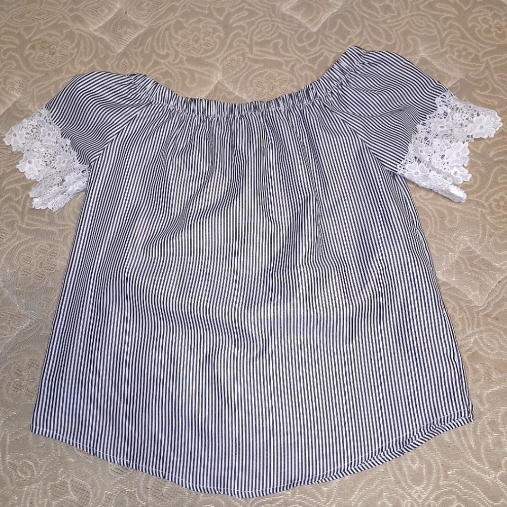 A Kontrol Contemporary short sleeve blue and white striped blouse in size small